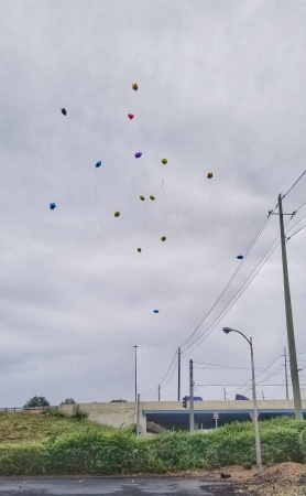 Ballons released in honor of Grady Steven Scott